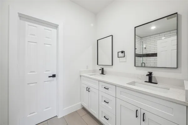 a bathroom with a toilet and shower