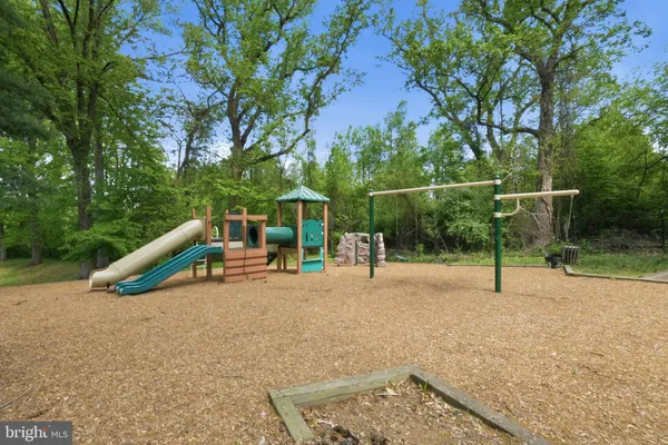 a view of a park with swings