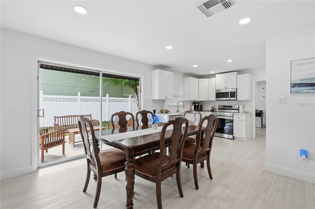 1946 Strathaven Road Winter Park, FL 32792 - Photo 21 of 37 a dining room with furniture and window