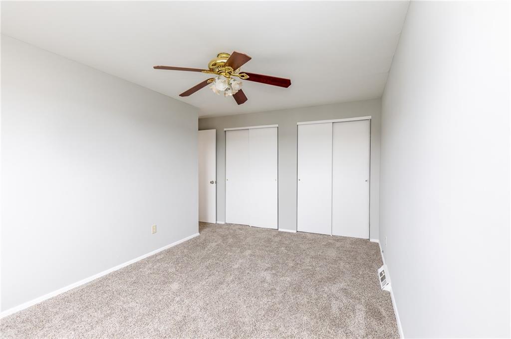 826 Ridge Avenue McKees Rocks, PA 15136 - Photo 13 of 22 a view of a room with a ceiling fan