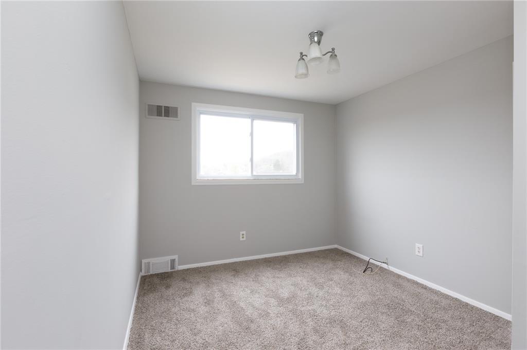 826 Ridge Avenue McKees Rocks, PA 15136 - Photo 15 of 22 an empty room with a window