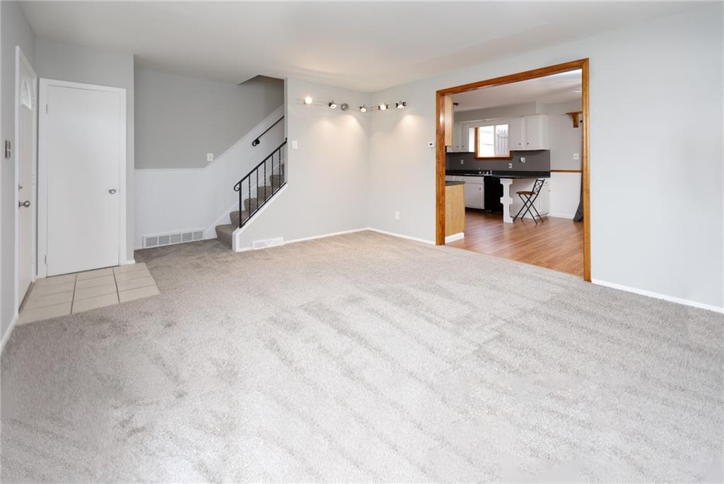 826 Ridge Avenue McKees Rocks, PA 15136 - Photo 5 of 22 a view of empty room with wooden floor and furniture