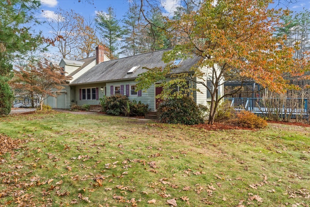 13 Highland Road Boxford, MA 01921 - Photo 1 of 35 a front view of house with yard and trees around