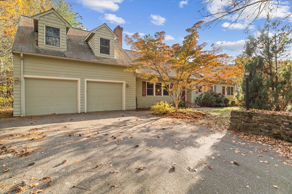 13 Highland Road Boxford, MA 01921 - Photo 2 of 35 a front view of a house with a yard