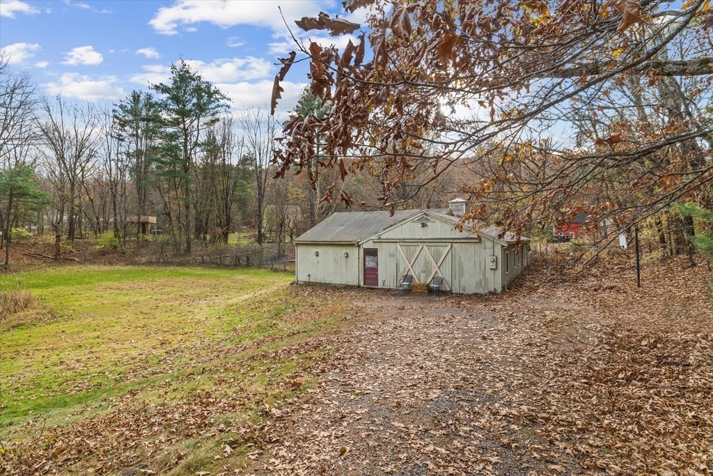 13 Highland Road Boxford, MA 01921 - Photo 22 of 35 a view of a house with a yard