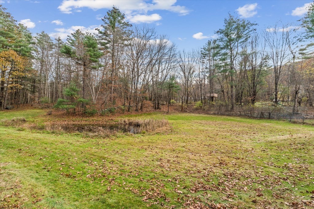 13 Highland Road Boxford, MA 01921 - Photo 27 of 35 a view of a yard with a house