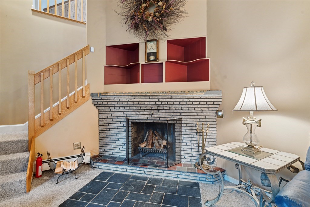 13 Highland Road Boxford, MA 01921 - Photo 4 of 35 a living room with furniture and a fireplace