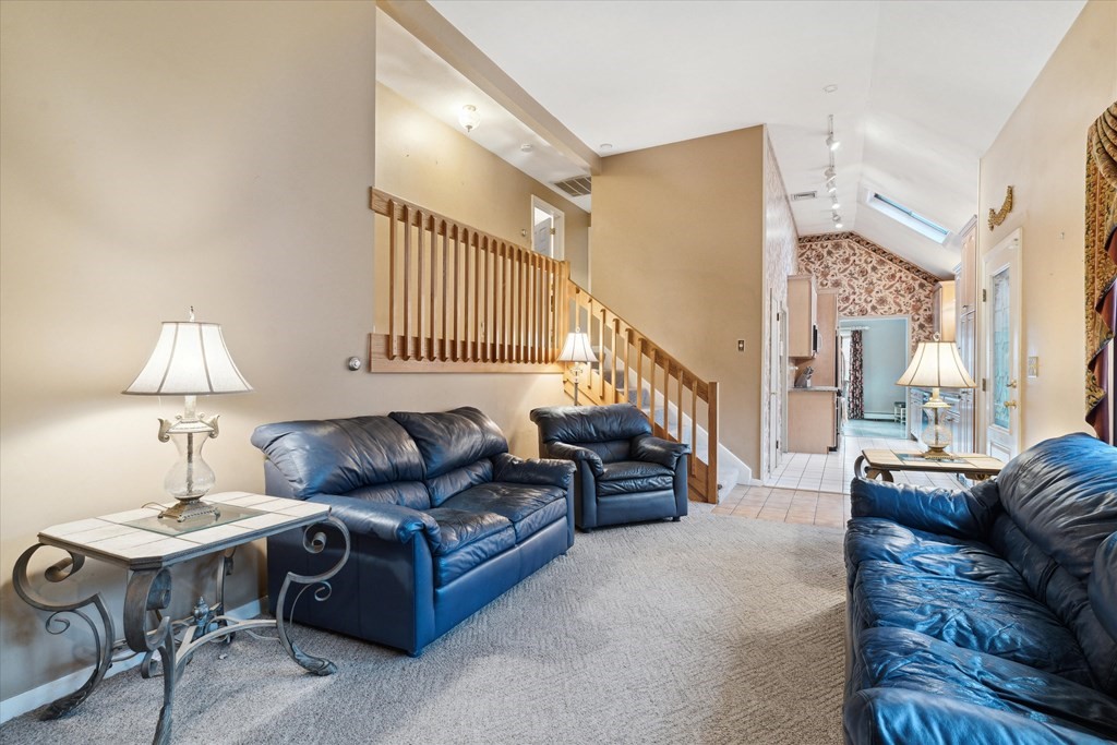 13 Highland Road Boxford, MA 01921 - Photo 5 of 35 a living room with furniture and a large window