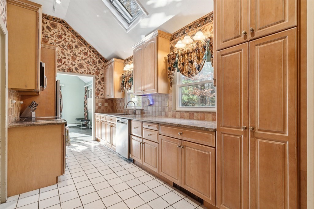 13 Highland Road Boxford, MA 01921 - Photo 6 of 35 a kitchen with stainless steel appliances granite countertop a refrigerator and a sink