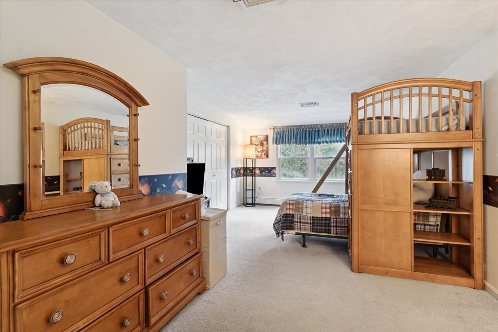 13 Highland Road Boxford, MA 01921 - Photo 10 of 35 a living room with furniture and a window
