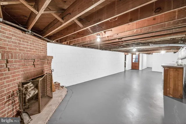a living room with fireplace