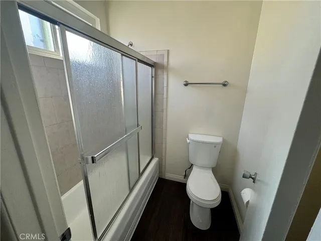 a bathroom with a toilet and a sink