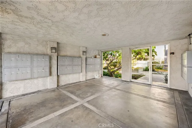 a view of empty room with outdoor view