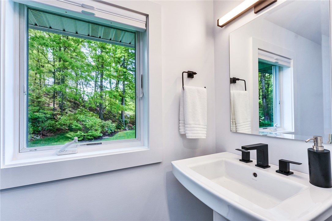5 Wicklow Road Westerly, RI 02891 - Photo 33 of 37 A third bathroom is close to the third bedroom and is located away from the other bedrooms..
