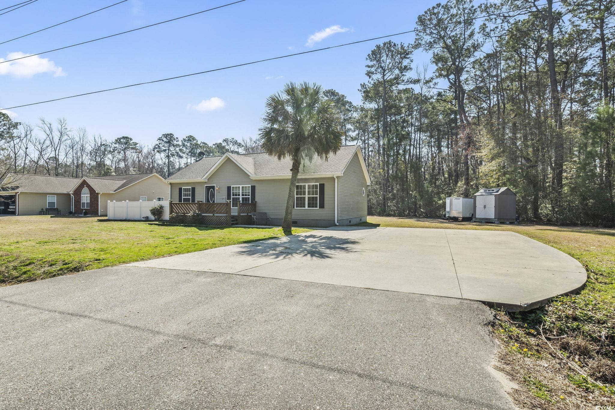 2192 Bell Road Longs, SC 29568 - Photo 16 of 19 View of front of property featuring a storage shed