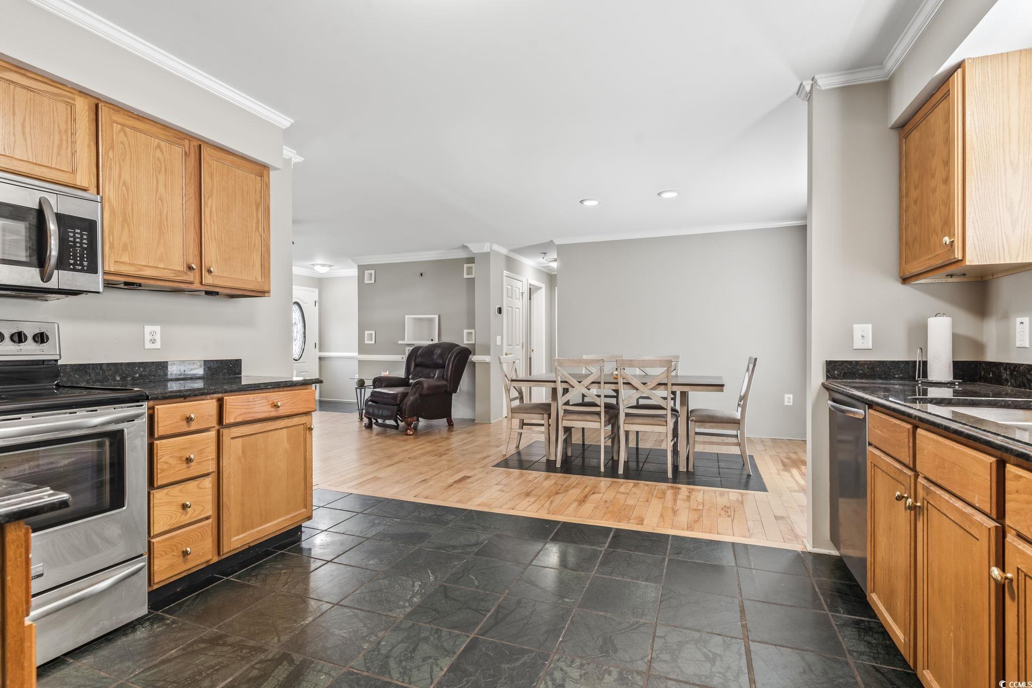 2192 Bell Road Longs, SC 29568 - Photo 4 of 19 Kitchen featuring dark wood finished floors, stack