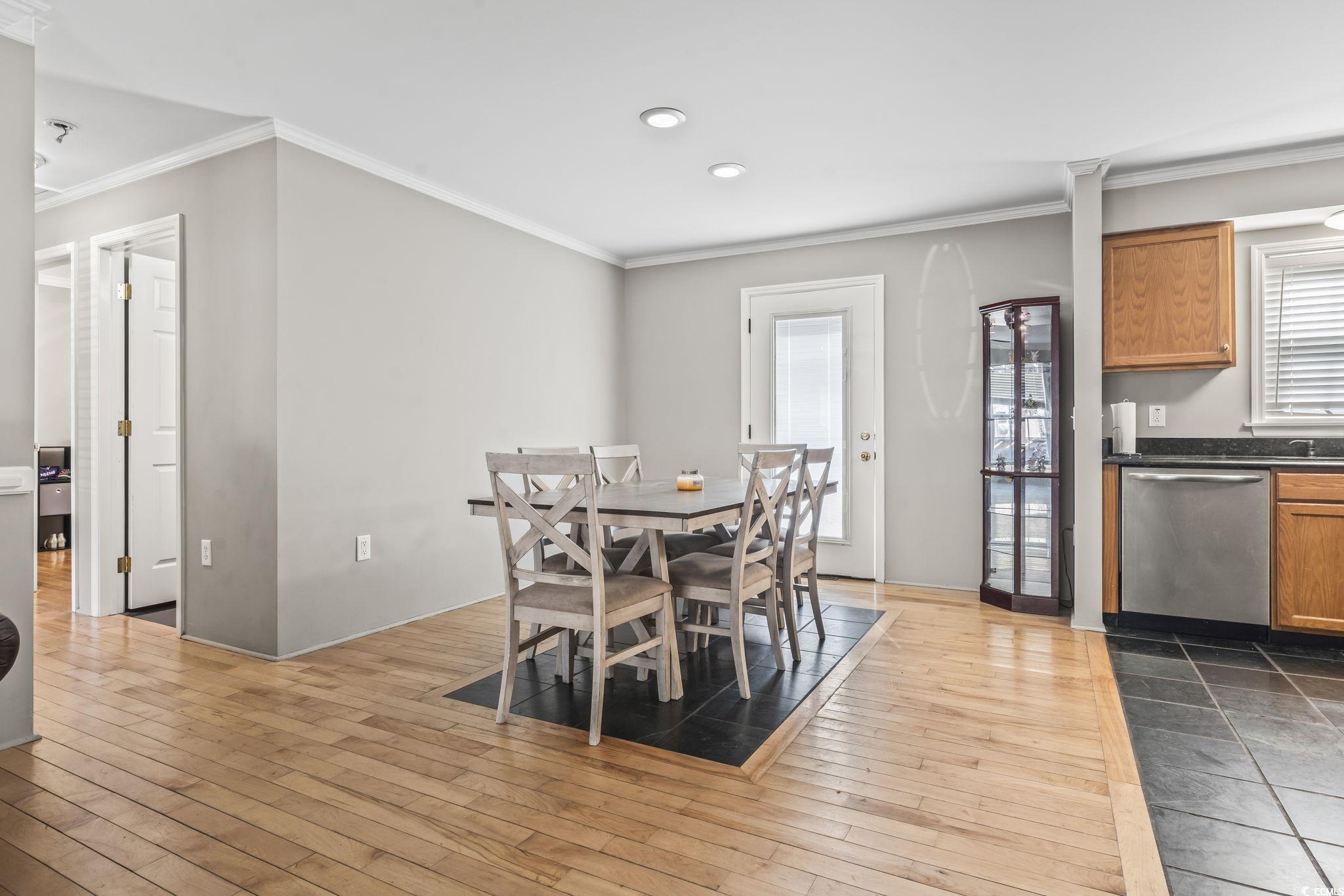 2192 Bell Road Longs, SC 29568 - Photo 6 of 19 Dining space featuring wood-type flooring and crow