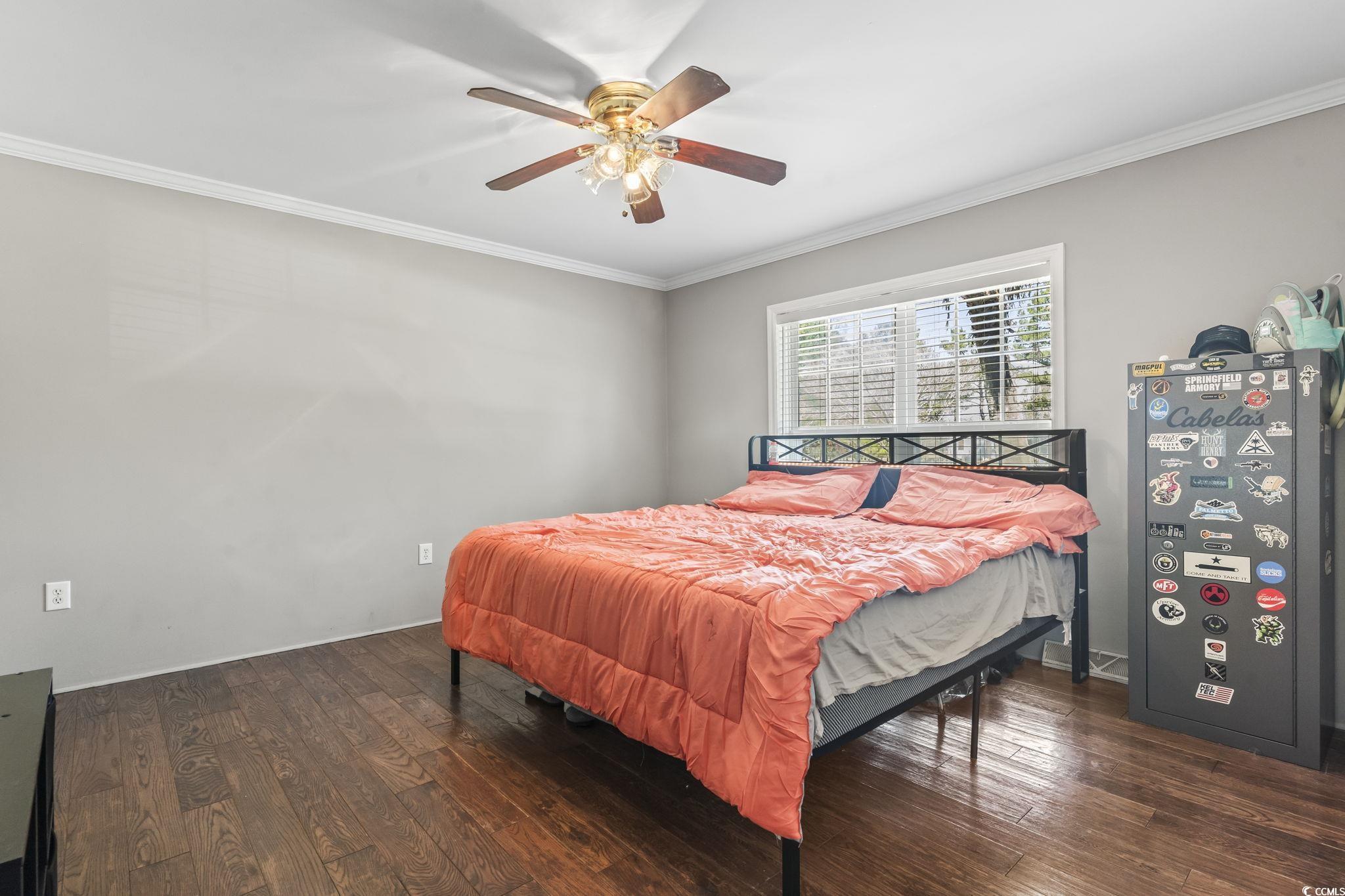 2192 Bell Road Longs, SC 29568 - Photo 8 of 19 Bedroom featuring ornamental molding, wood finishe