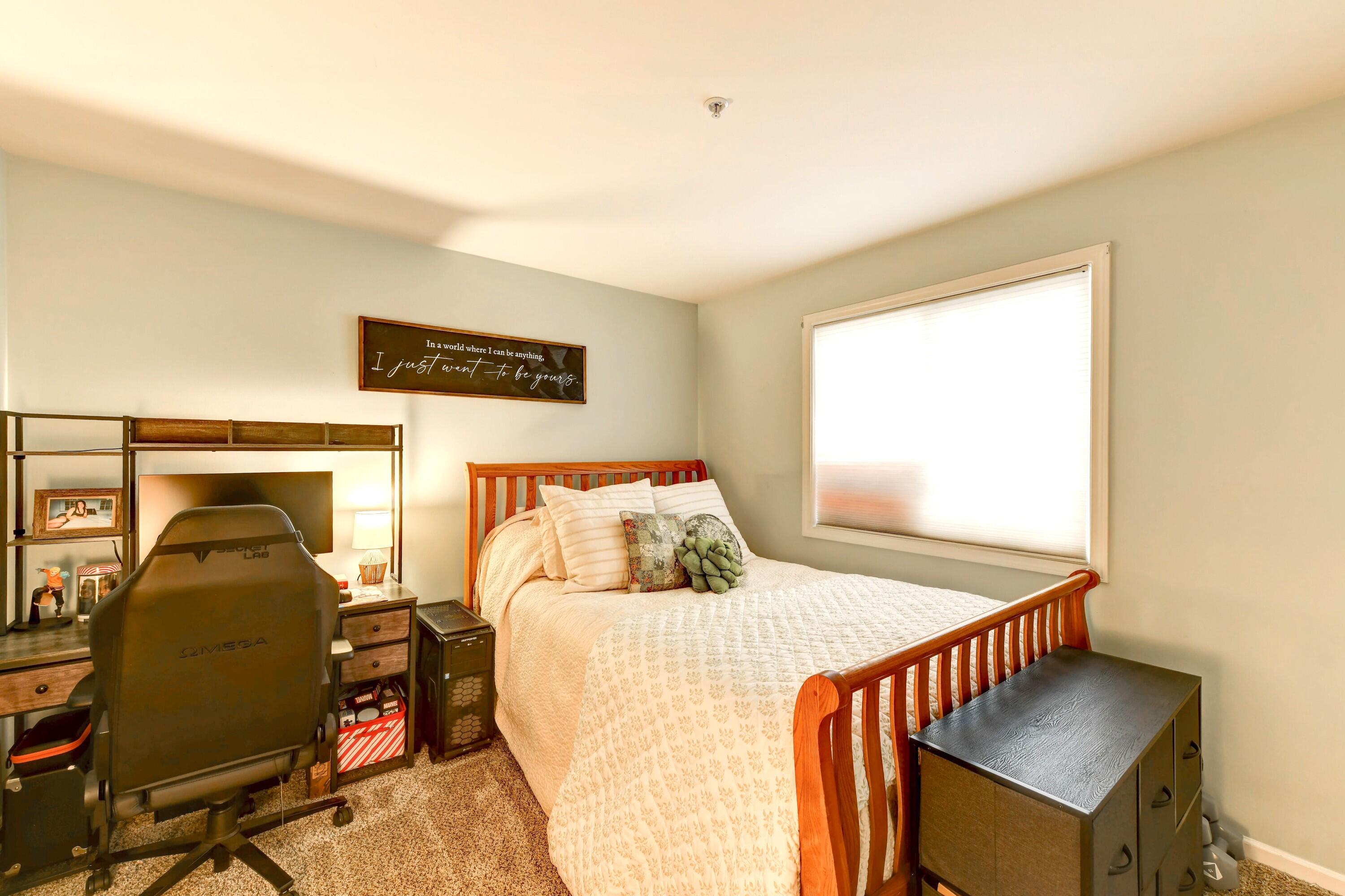 2343 99th Street, Unit 1A Highland, IN 46322 - Photo 14 of 18 a bedroom with furniture and a window