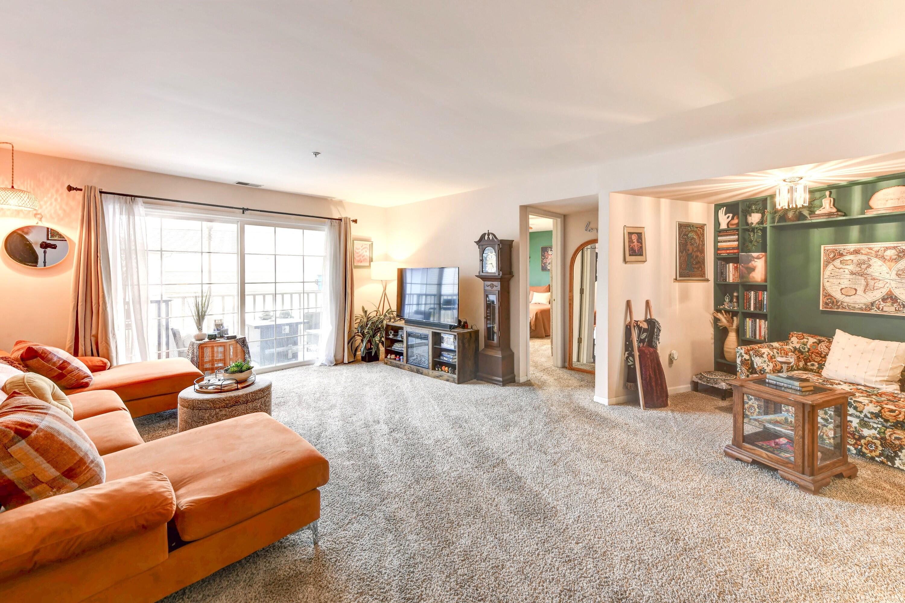 2343 99th Street, Unit 1A Highland, IN 46322 - Photo 3 of 18 a living room with furniture and a large window