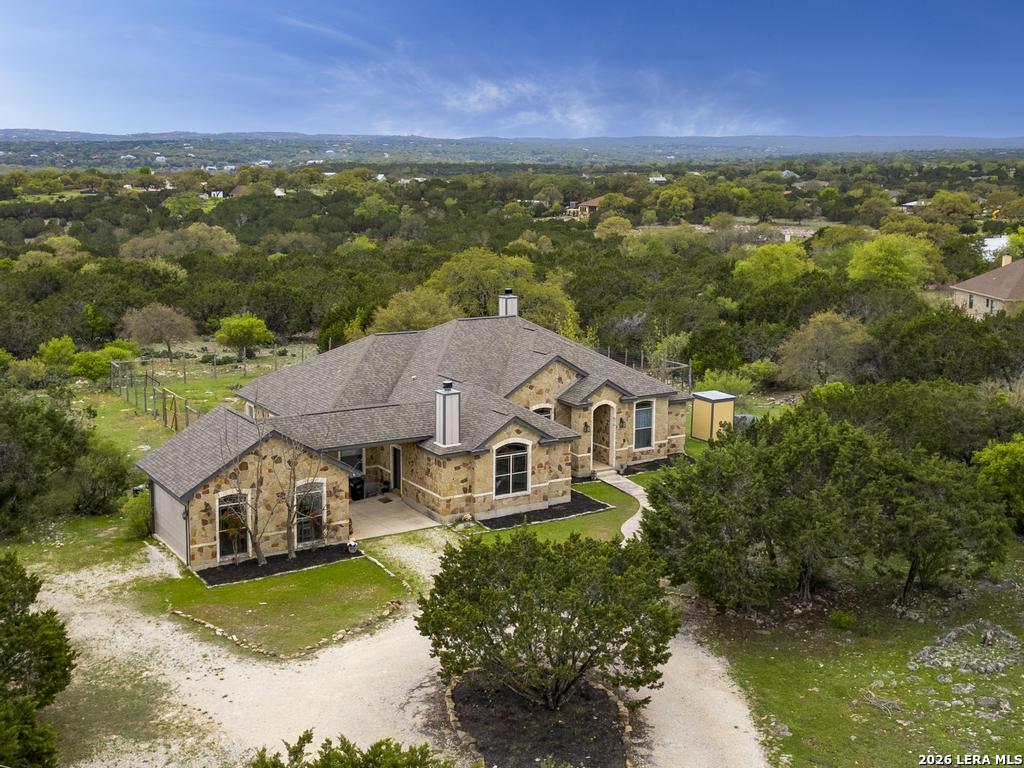 101 Shady Ridge Drive Boerne, TX 78006 - Photo 35 of 44 an aerial view of a house with a yard