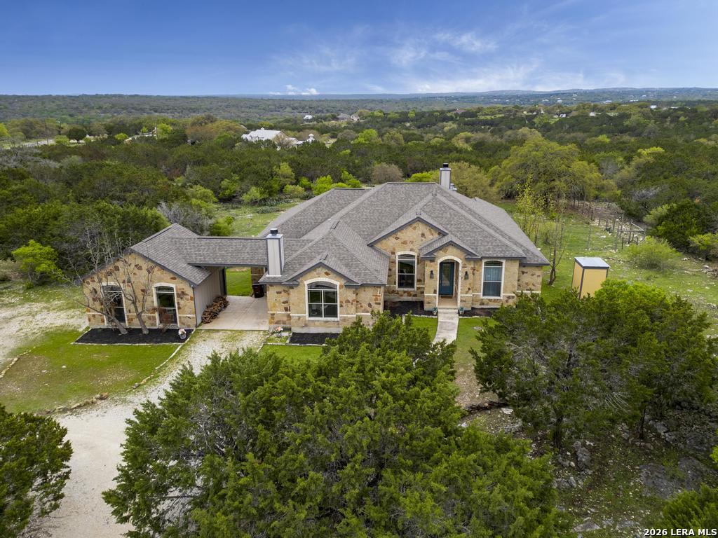 101 Shady Ridge Drive Boerne, TX 78006 - Photo 38 of 44 an aerial view of a house with a yard