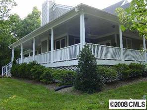 11207 Asbury Chapel Road Huntersville, NC 28078 - Photo 2 of 8 a view of a house with backyard and garden