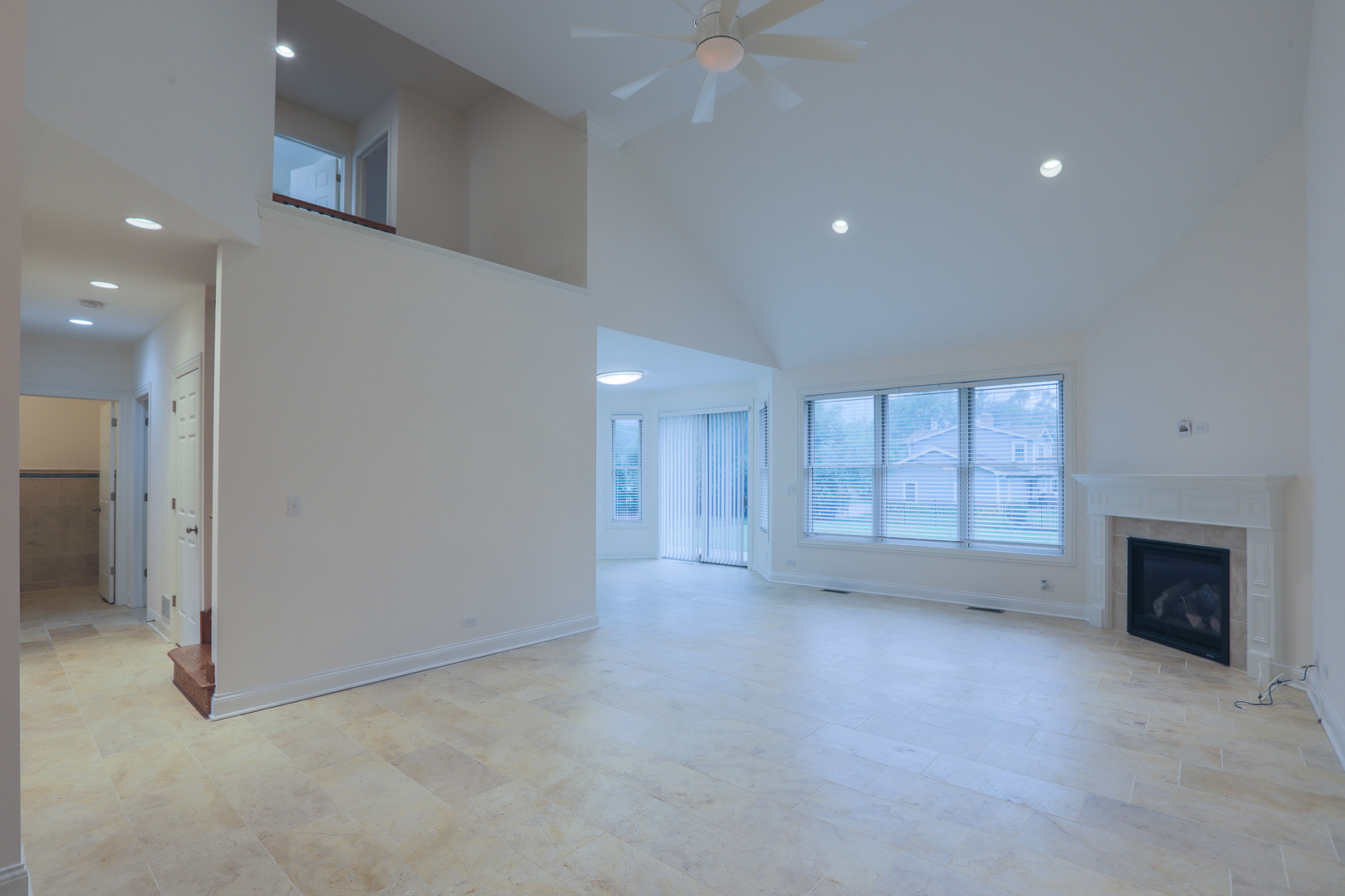 7820 South County Line Road Burr Ridge, IL 60527 - Photo 12 of 40 an empty room with windows and fireplace