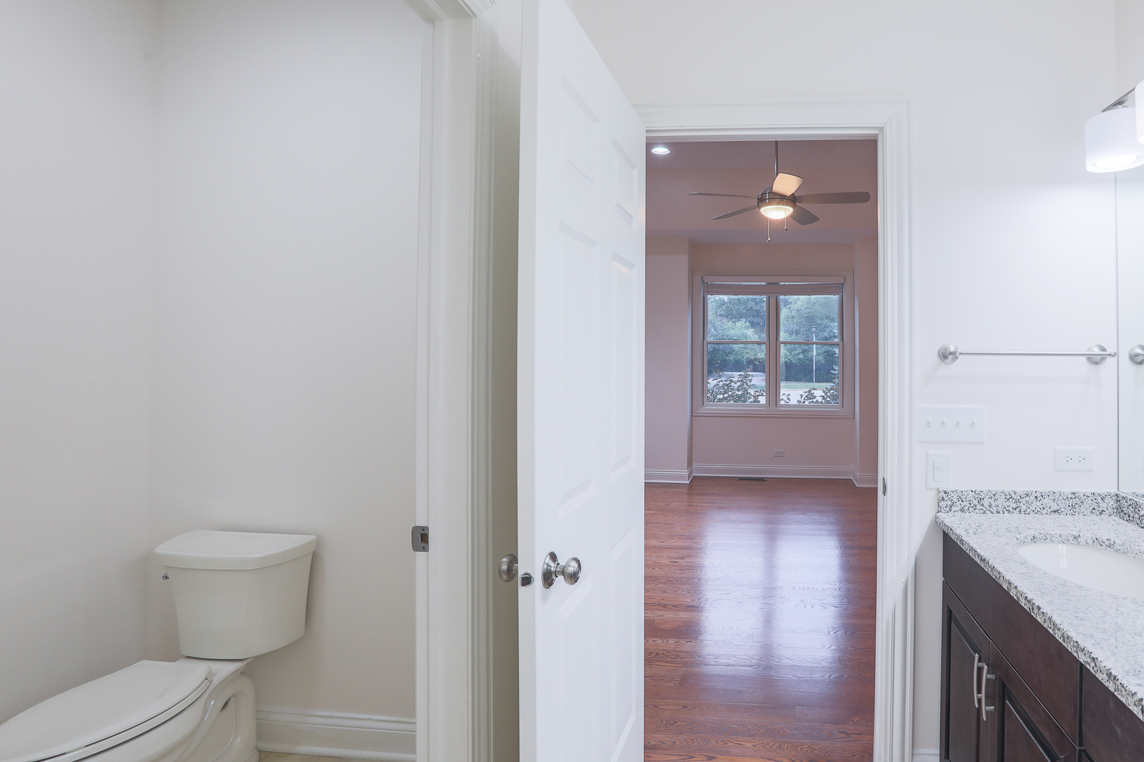 7820 South County Line Road Burr Ridge, IL 60527 - Photo 26 of 40 a bathroom with a sink and a toilet