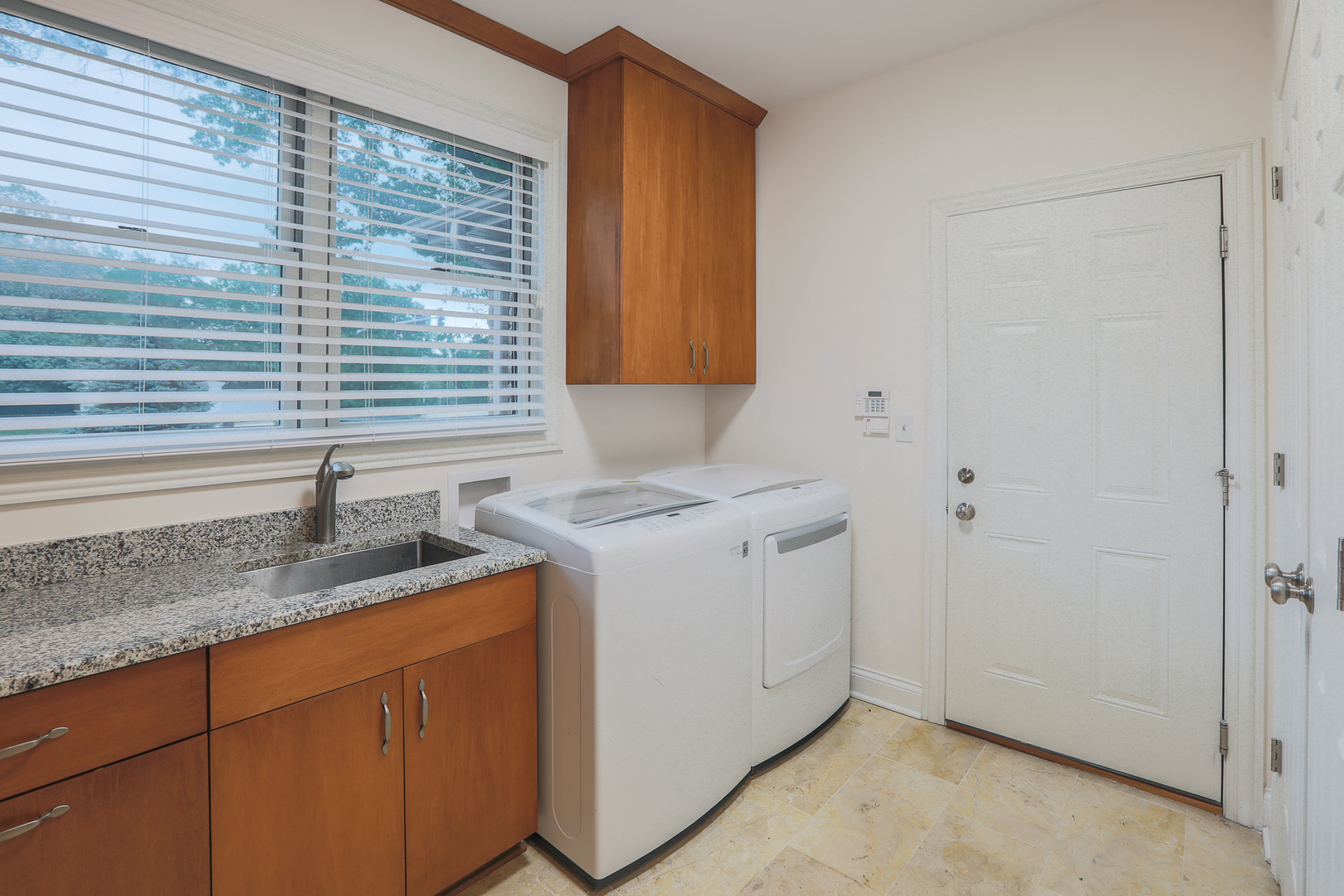 7820 South County Line Road Burr Ridge, IL 60527 - Photo 40 of 40 a utility room with granite countertop cabinets