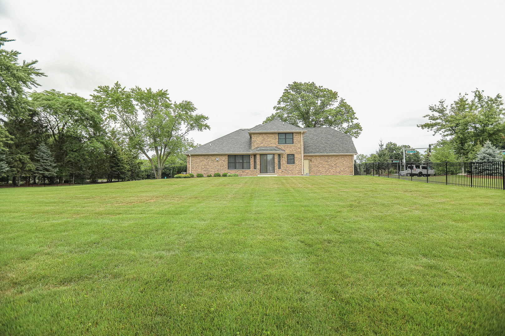 7820 South County Line Road Burr Ridge, IL 60527 - Photo 5 of 40 a view of a house with a yard