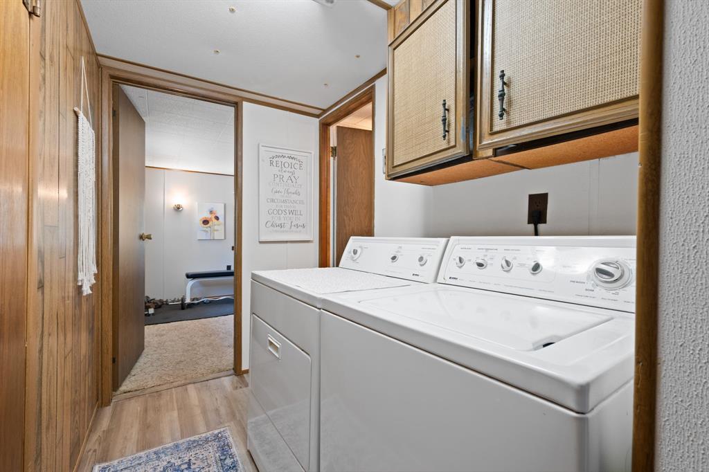 1500 County Road 404 Comanche, TX 76442 - Photo 26 of 39 a utility room with dryer and washer