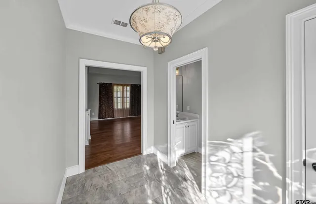 a view of a chandelier in a room