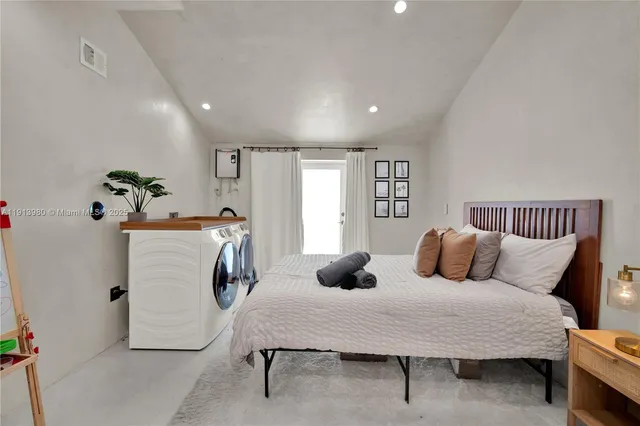 a bedroom with furniture and a couch