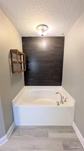 a bathroom with a bathtub