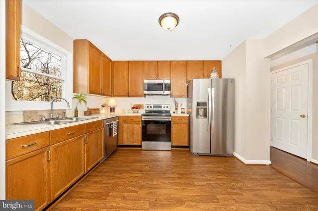 a view of a livingroom with furniture and wooden floor