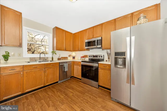 a bathroom with a sink toilet and mirror