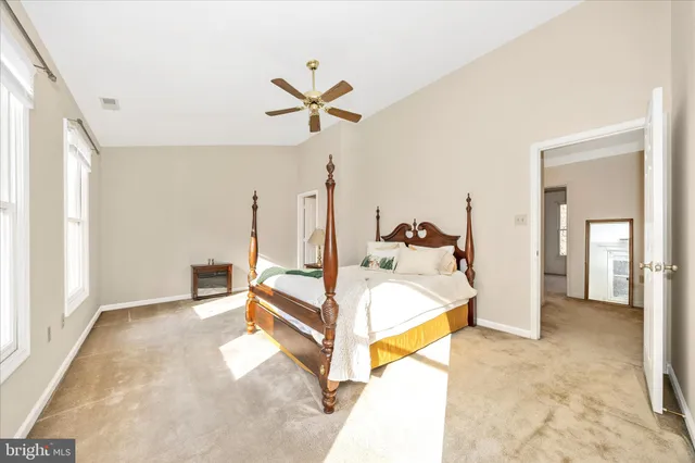 a dining room with furniture and a garage