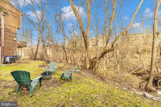 a view of a park with swings and slides