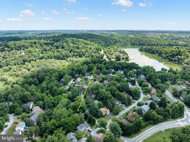 a view of staircase with white walls and windows