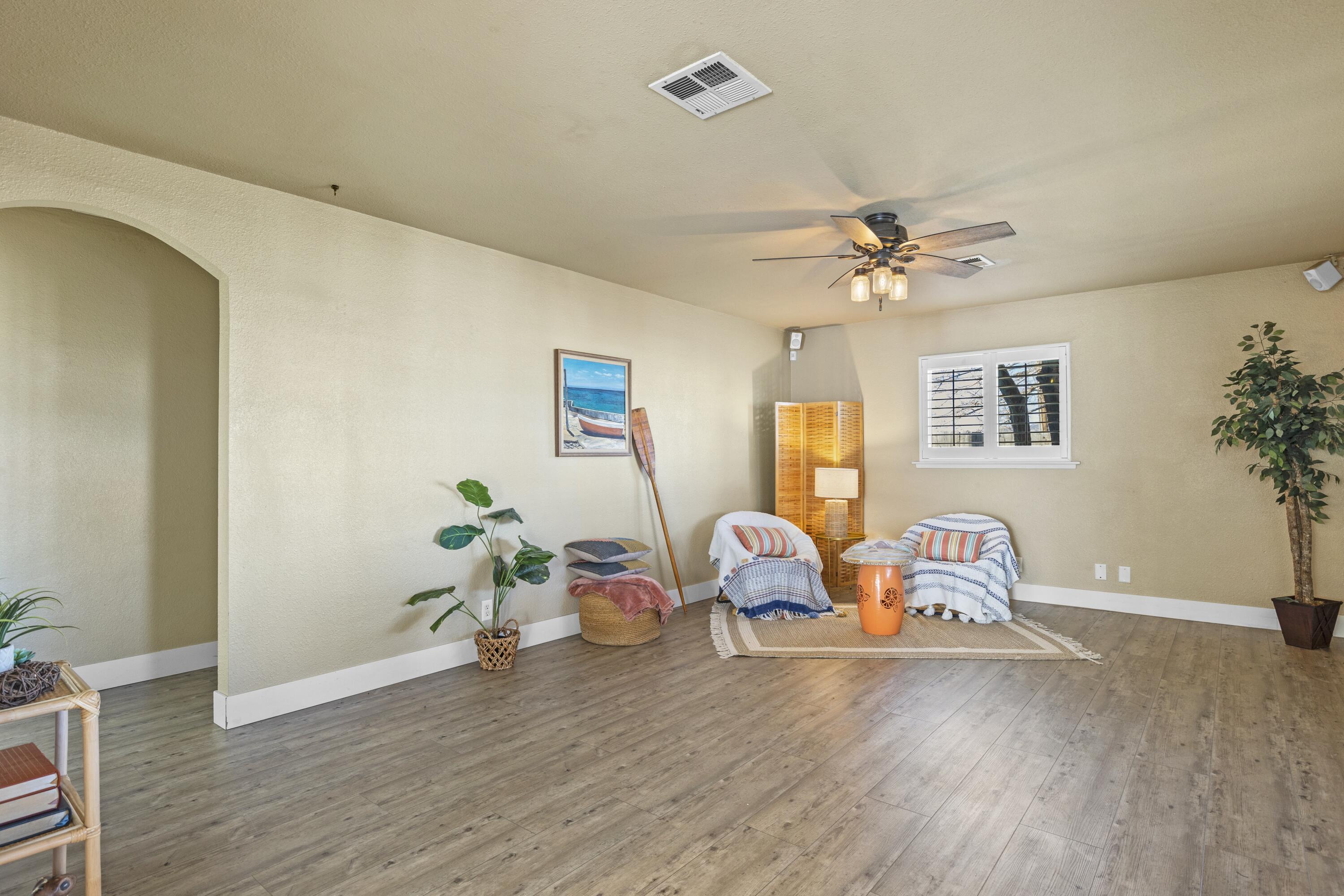801 Beech Street Tehachapi, CA 93561 - Photo 8 of 24 a view of a livingroom with wooden furniture