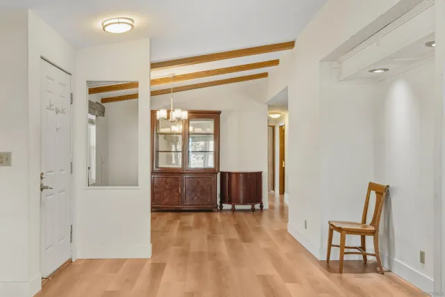 a kitchen with stainless steel appliances granite countertop a stove sink and cabinets