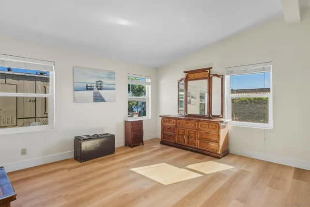 a room with furniture and flat screen tv