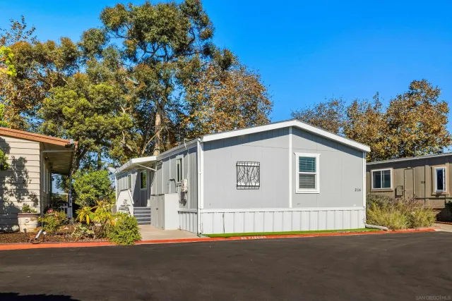 a view of a chair and table in the balcony
