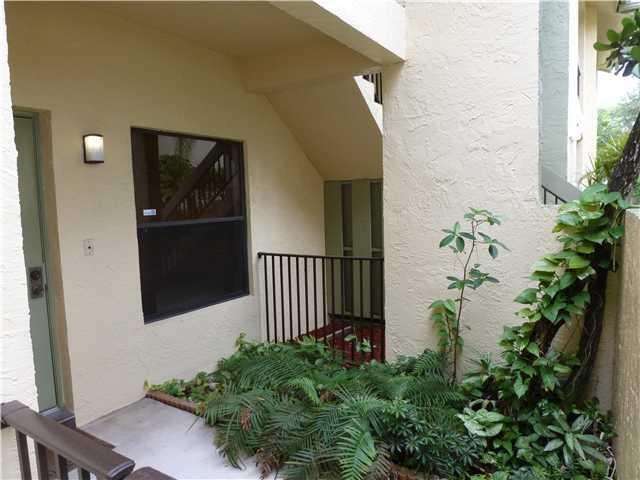 4409 Northwest 22nd Road, Unit 403 Pompano Beach, FL 33066 - Photo 2 of 10 Exterior Front