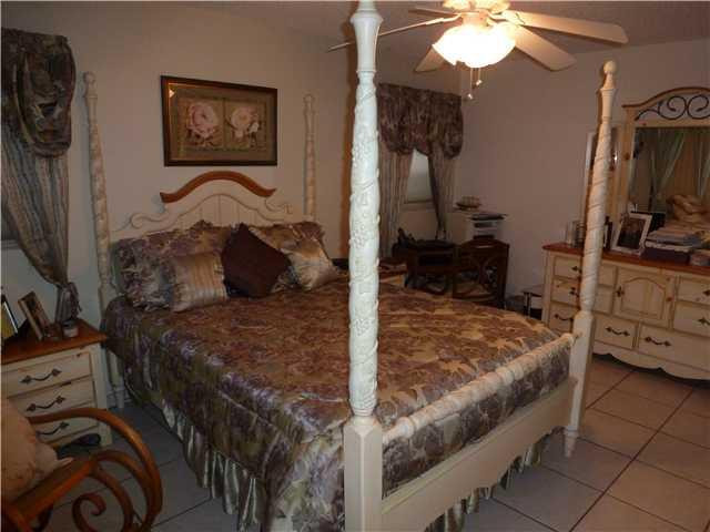 4409 Northwest 22nd Road, Unit 403 Pompano Beach, FL 33066 - Photo 7 of 10 Master Bedroom