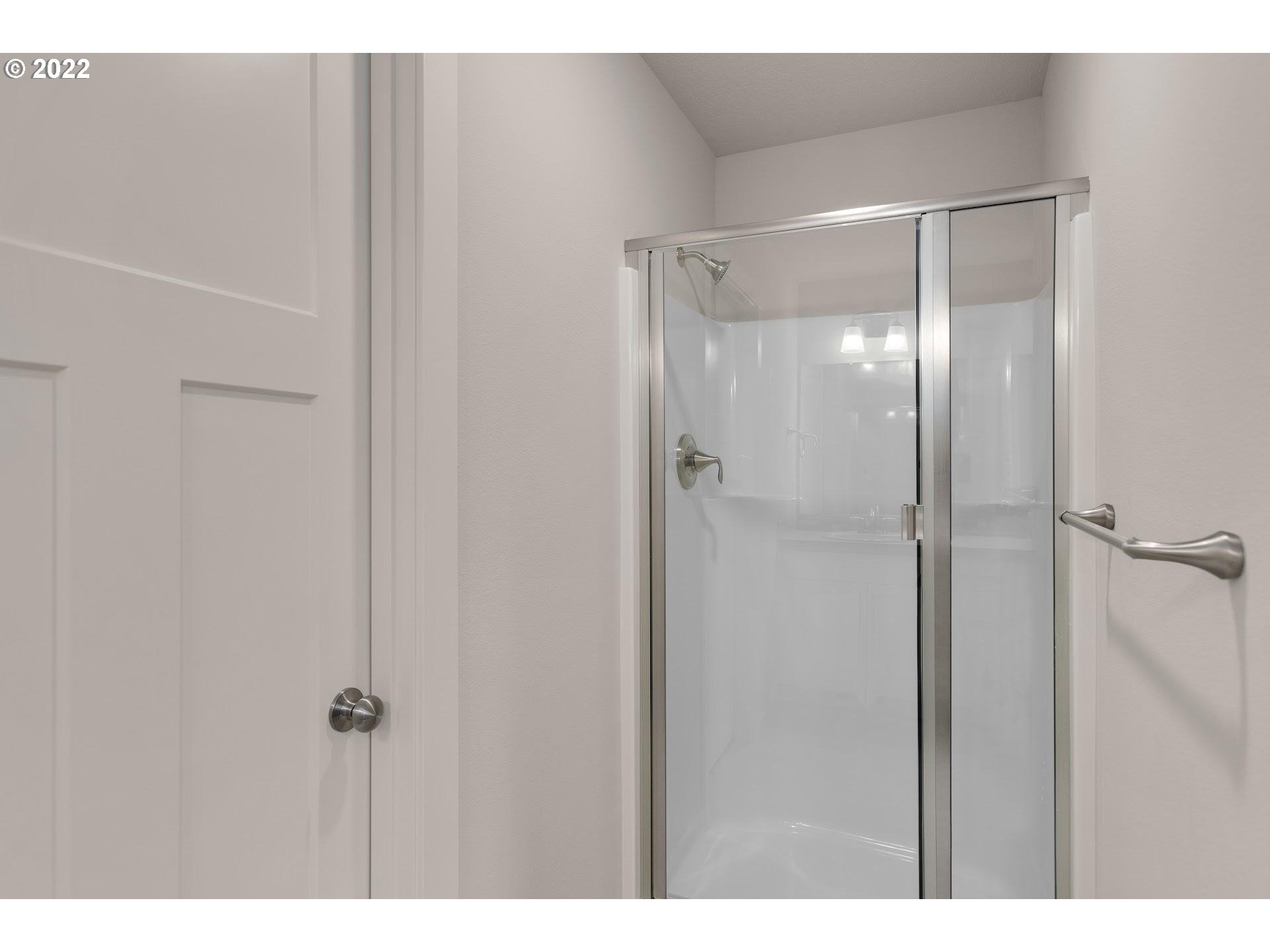 4133 South Waters Edge Way Ridgefield, WA 98642 - Photo 25 of 31 a bathroom with a shower