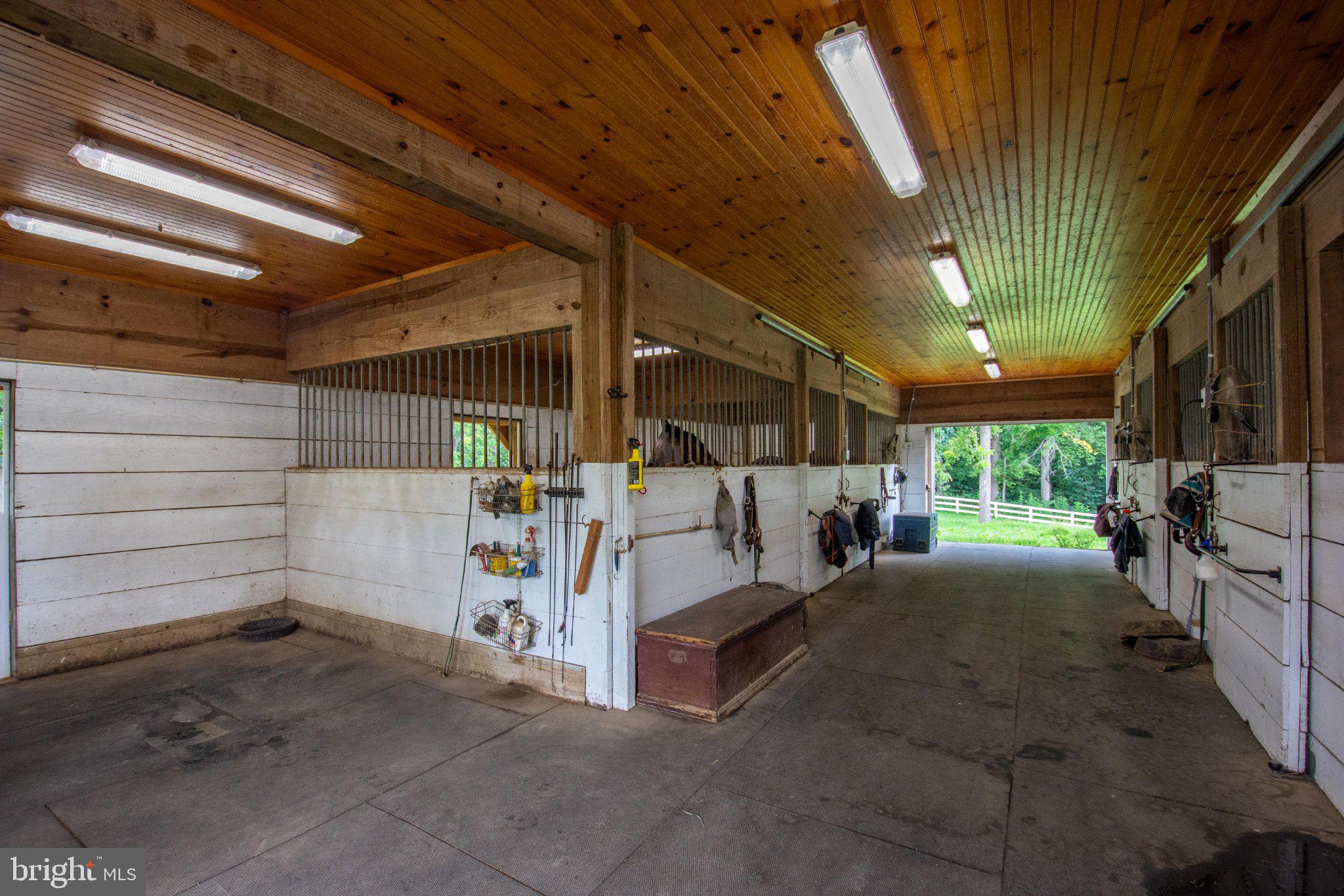 246 Mill Swamp Road Edgewater, MD 21037 - Photo 74 of 97 Spacious equestrian barn interior.