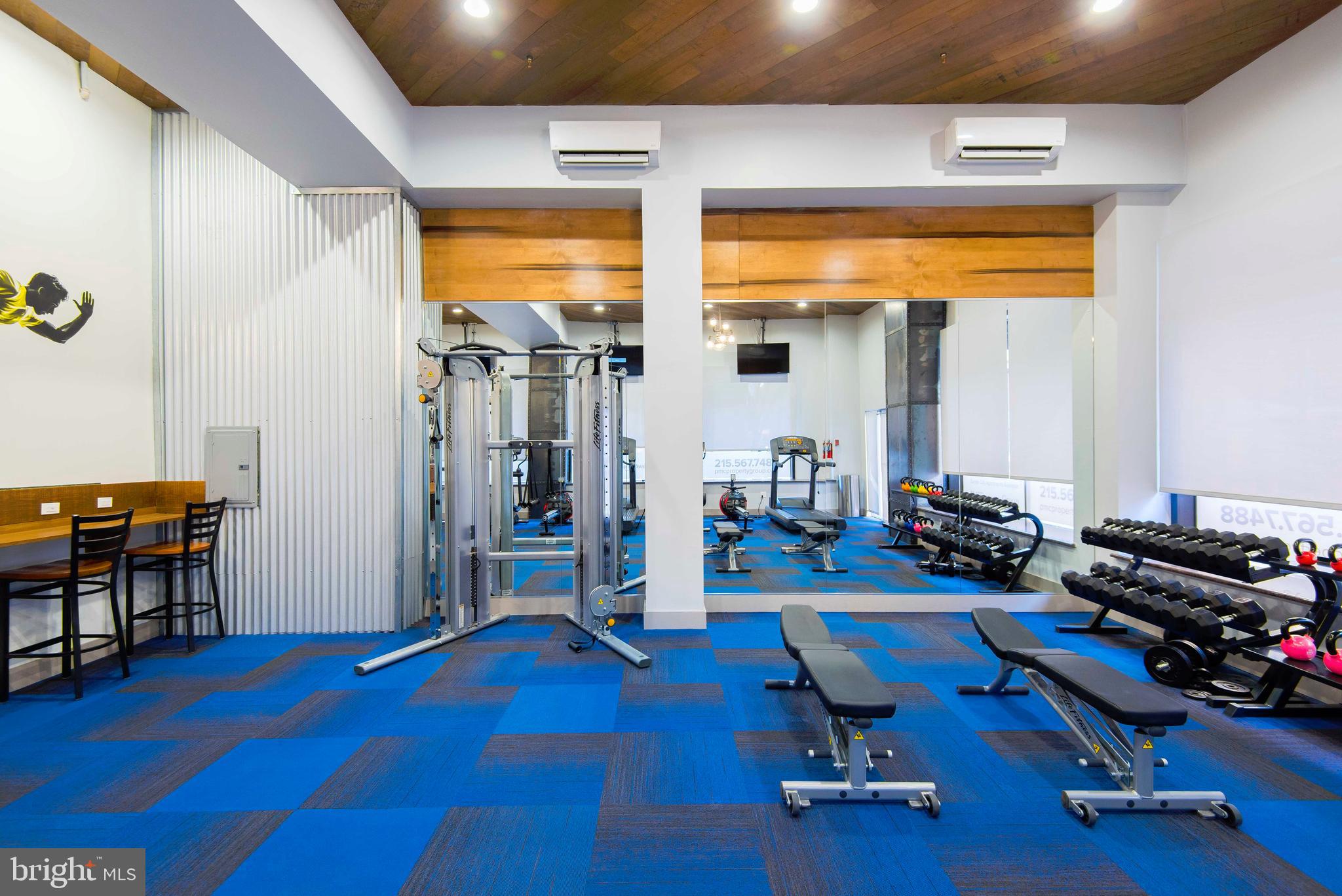 2100-02 Walnut Street, Unit 7G Philadelphia, PA 19103 - Photo 12 of 20 a view of a room with gym equipment