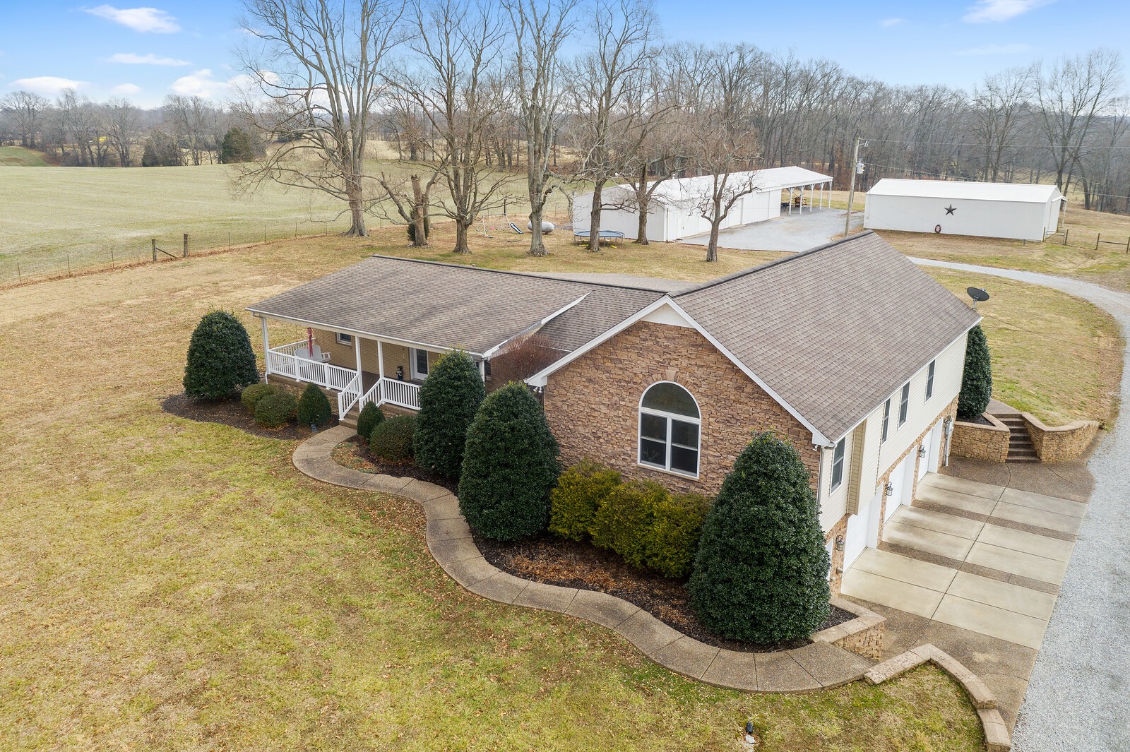 415 Woodruff Road Adams, TN 37010 - Photo 3 of 47 a view of a house with pool and a yard